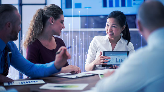 People analyzing data in a meeting room