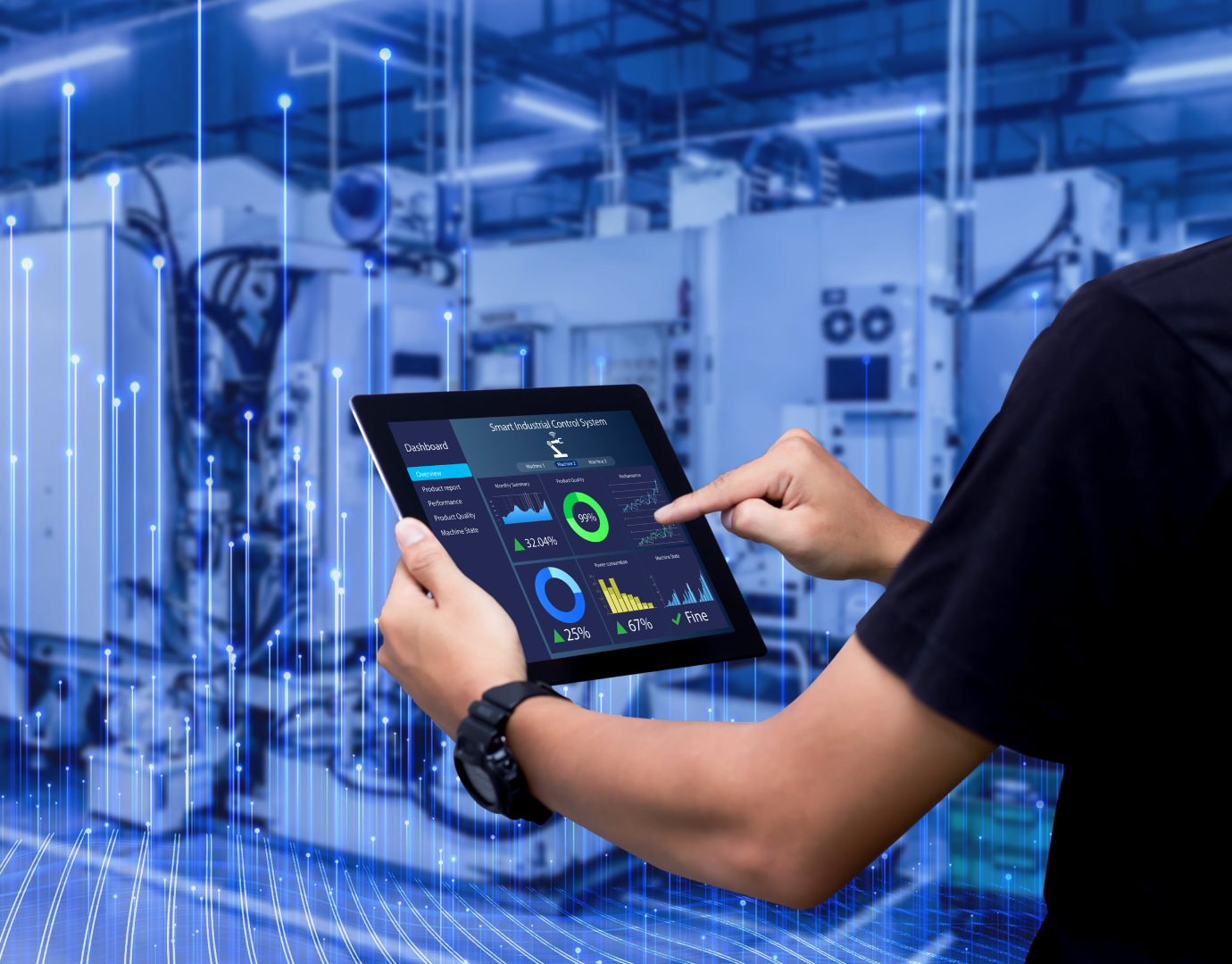 Person in front of equipment, reviewing data on a tablet